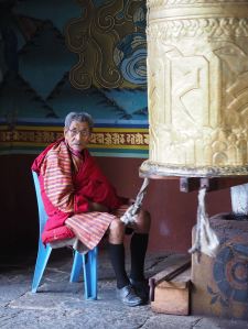 Prayer wheel attendant