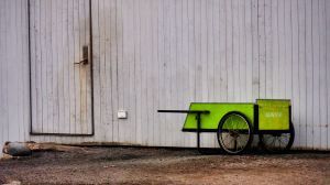 Wheelbarrow on wall